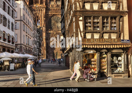 France, Alsace, Strasbourg, street scene, passers-by, houses, Strasbourg Cathedral, facades, detail, Stock Photo