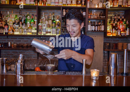 Pouring creative cocktails at Bronx Liquid Parlour, Bangkok, Thailand Stock Photo