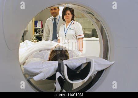 A patient (posed by hospital staff) is prepared to be examined in an MRI scanner in a new West London hospital Stock Photo