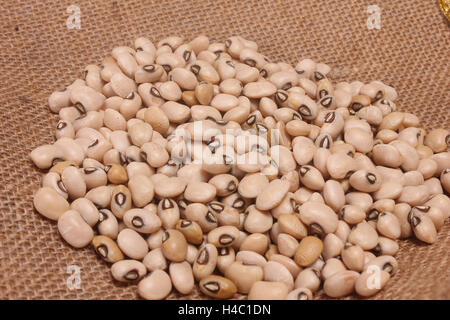 Close up Black eyed peas on sack background. Stock Photo