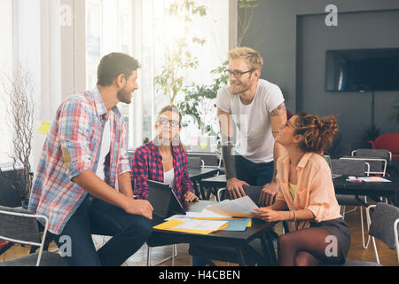 Young business people working at office on new project Stock Photo