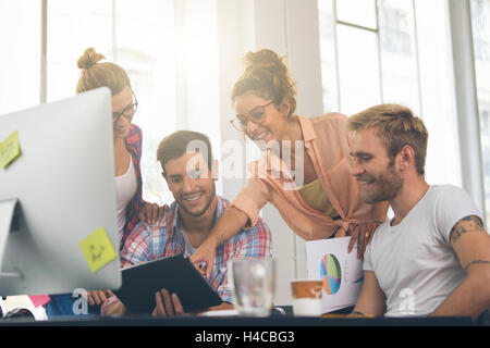 Young business people working at office on new project Stock Photo