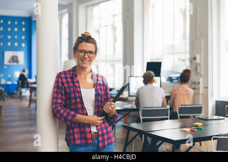 Portrait of a handsome designer in the office Stock Photo