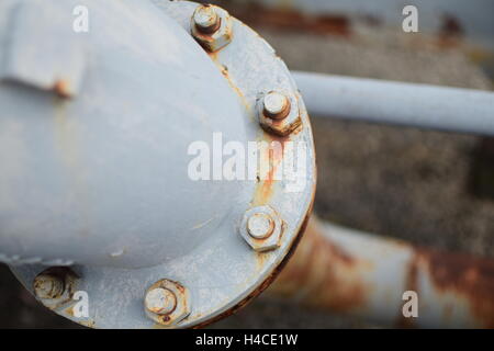 Large Pipe Line Connected with Rusty Metal Bolts Stock Photo