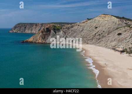 Beach of Burgau with the imposing rock coast at the Atlantic in the Parque Natural do Sudoeste Alentejano e Costa Vicentina, Algarve, Portugal, Europe Stock Photo