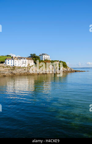 Houses on the coast built on rocks at Portmellon, Cornwall, England, UK Stock Photo