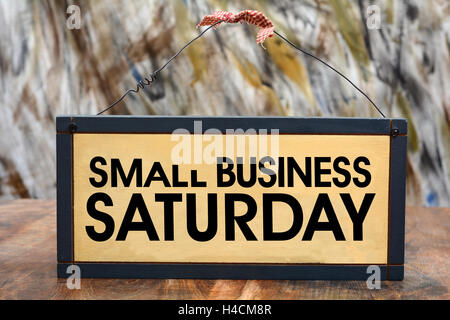 Small Business Saturday Sign on Wood Frame. Stock Photo