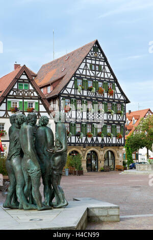 Germany, Baden-Wurttemberg, Pfullingen, city hall II, marketplace, bronze figure 'dispute' Stock Photo