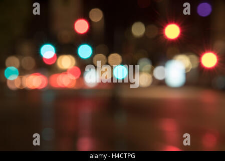 blurred street with bokeh of colored traffic lights Stock Photo