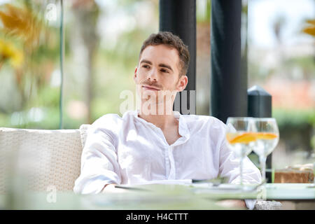 young man in the restaurant Stock Photo