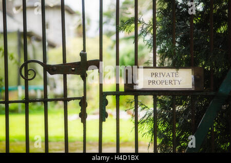 Private property sign on gate Stock Photo