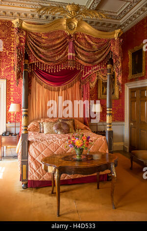 Red Bedroom in Holkham Hall, Wells-next-the-Sea, Norfolk, England Stock Photo