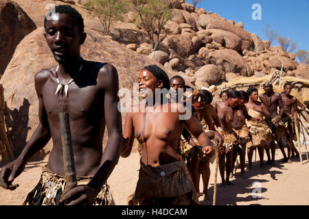 Damara people performing a traditional dance in cultural village in Damaraland district in Namibia, South Africa Stock Photo