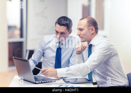 two businessmen having discussion in office Stock Photo
