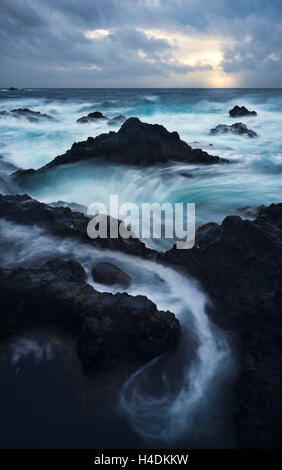 Lava coast with Ferarria, Sao Miguel, the Azores, Portugal Stock Photo