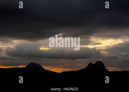 Storm clouds over the mountain Suilven at sunset,  Inverpolly National Nature Reserve, Sutherland, Scottish Highlands, Scotland Stock Photo