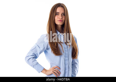 Woman with long hair wearing a blue shirt Stock Photo