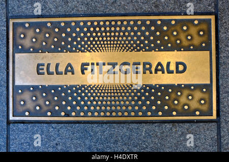 A closed up view of Ella Fitzgeralds' name plaques at Apollo theater's Walk of Fame.Harlem.New York City.USA Stock Photo