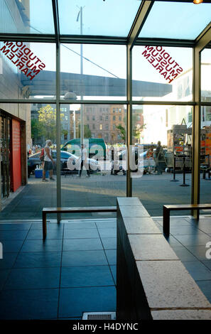 View of !25th street in the center of Harlem from the Studio Museum of Harlem.Harlem.New York City,USA Stock Photo