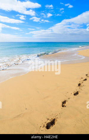 Footprints in sand on beautiful Jandia beach, Morro Jable, Fuerteventura, Canary Islands, Spain Stock Photo