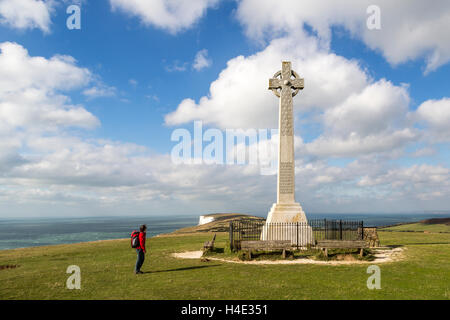 Walker at the Tennyson Monument, Tennyson Down, Isle of Wight, UK Stock Photo