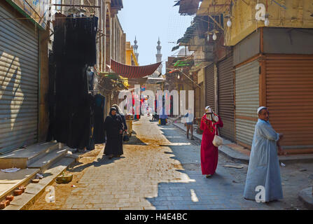 The open abaya shop (traditional women black dresses) in Al-Muizz street market, Cairo Egypt Stock Photo