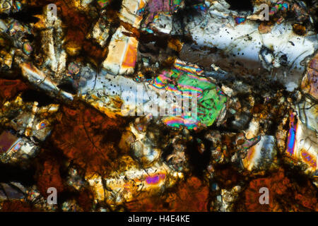 Plagioclase-Dolerite, Tedeswell Dale, Derbyshire, UK. Polarized photomicrograph Stock Photo