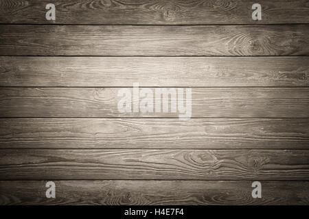 Rustic wood board background with nice studio lighting and elegant vignetting to draw the attention Stock Photo