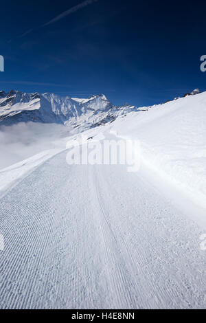 View to Ski slopes with the corduroy pattern in Elm ski resort, Swiss Alps, Switzerland Stock Photo