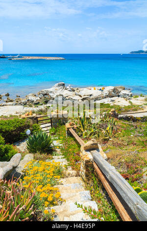 Walkway to Spiaggia del Riso beach on Sardinia island, Italy Stock Photo