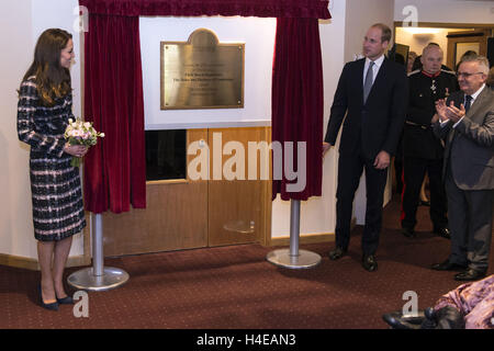 The Duke and Duchess of Cambridge unveil a plaque during a visit to Francis House hospice in Manchester. Stock Photo