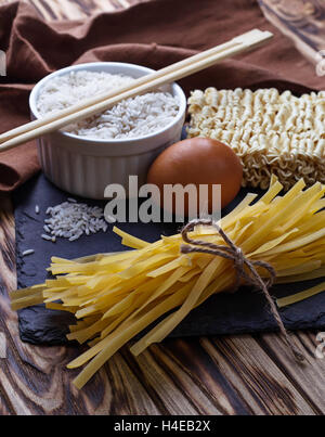 Dry Chinese egg noodles and ramen. Selective focus Stock Photo