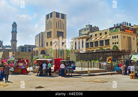 The market stalls next to Al Azhar Avenue offer fresh water, clothes and tourist souvenirs, Cairo Egypt Stock Photo