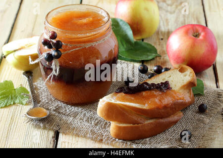 Juice apple and currants in a rustic style, healthy food. Stock Photo