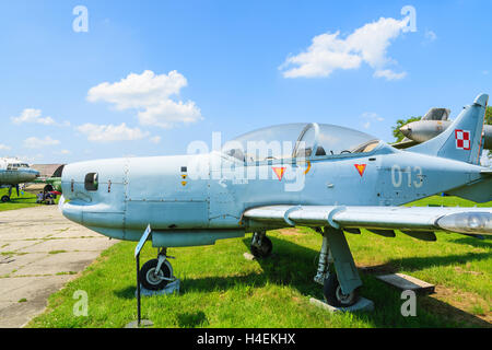 KRAKOW MUSEUM OF AVIATION, POLAND - JUL 27, 2014:  military training aircraft on exhibition in outdoor museum of aviation history in Krakow, Poland. In summer often airshows take place here. Stock Photo