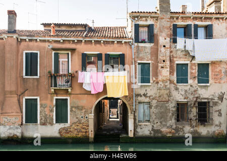 Scenery of hanging clothes in Venice, Italy Stock Photo