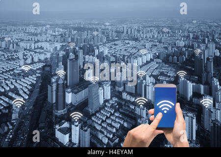 Wifi icon and Paris city with network connection concept, Shanghai smart city and wireless communication network, abstract image Stock Photo