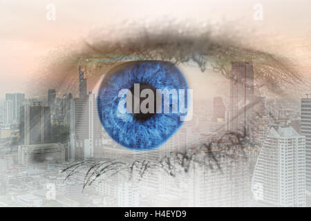 Double exposure image of human eye with business center district Bangkok city. Business future concept.