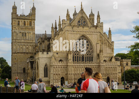 Exeter, Devon, England, UK - 30 September 2016:Unidentified people walk in front of  Exeter Cathedral. Stock Photo