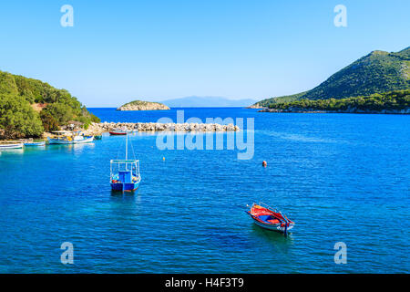 Colorful fishing boats on blue sea, Kefalonia island, Greece Stock Photo