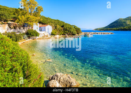 View of bay with old house and fishing boats, Kefalonia island, Greece Stock Photo