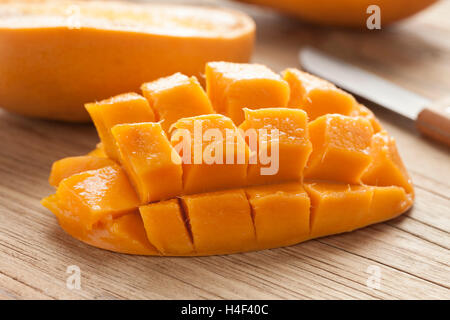 Fresh ripe juicy half yellow mango Stock Photo