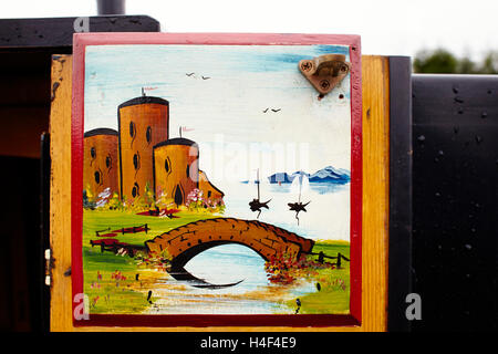 Castles painting on door of narrowboat Stock Photo