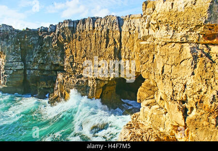 The cave in coastal rocks of Cascais is famous as the Boca do Inferno (The Jaws of Hell) or the Devil's Cave, Portugal.