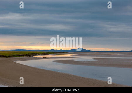 Sunset over the Llyn Peninsula from the Afon Glaslyn, Snowdonia National Park, North Wales, UK Stock Photo