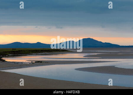 Sunset over the Llyn Peninsula from the Afon Glaslyn, Snowdonia National Park, Gwynedd, North Wales, UK Stock Photo
