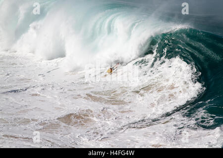 Extreme body boarding at Waimea Bay on the north shore of Oahu Hawaii USA Stock Photo