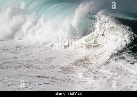 Extreme body boarding at Waimea Bay on the north shore of Oahu Hawaii USA Stock Photo