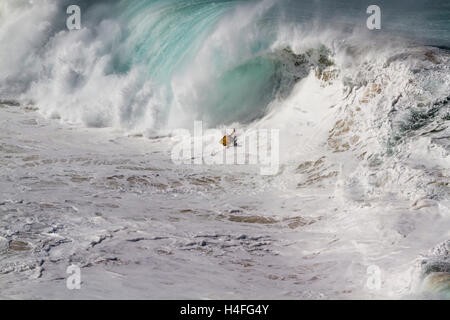 Extreme body boarding at Waimea Bay on the north shore of Oahu Hawaii USA Stock Photo