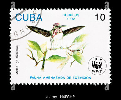 Postage stamp from Cuba depicting a bee hummingbird (Mellisuga helenae) Stock Photo